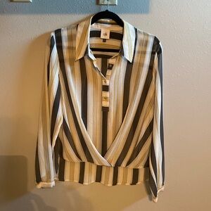 Cabi blouse.  Very sheer. Gathered detail in front. Longer in back.